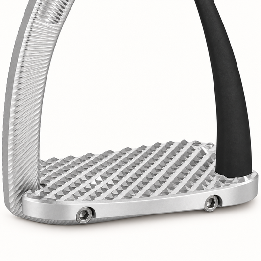 Close-up of the Safety Air Stirrup's diagonal silver tread studs, front bolts and lower frame connections